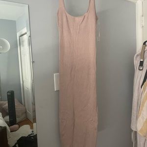 Nude midi dress with small side slit